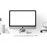 silver imac near white ceramic kettle